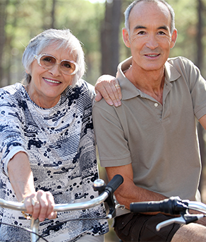 Senior couple enjoying outdoor activities/living options at the best nursing home in college station tx