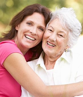 Senior visited by family during skilled nursing care